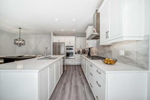 1941 Mahogany Boulevard Se, Calgary, AB - Indoor Photo Showing Kitchen With Upgraded Kitchen