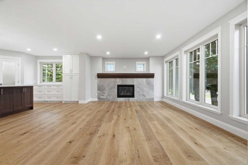 1131 Edgemont Road Nw, Calgary, AB - Indoor Photo Showing Living Room With Fireplace