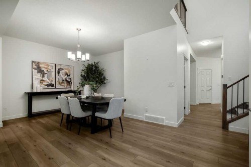 882 Bluerock Way Sw, Calgary, AB - Indoor Photo Showing Dining Room