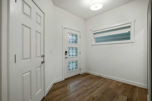 882 Bluerock Way Sw, Calgary, AB - Indoor Photo Showing Other Room