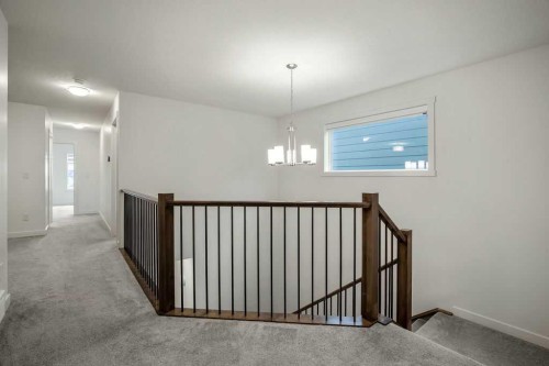 882 Bluerock Way Sw, Calgary, AB - Indoor Photo Showing Other Room
