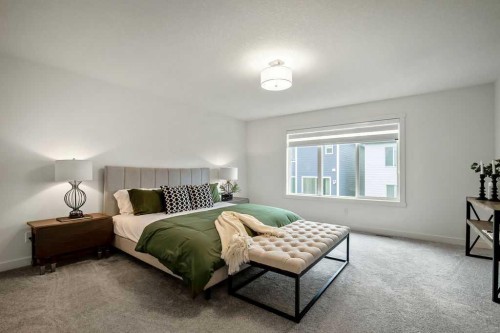 882 Bluerock Way Sw, Calgary, AB - Indoor Photo Showing Bedroom