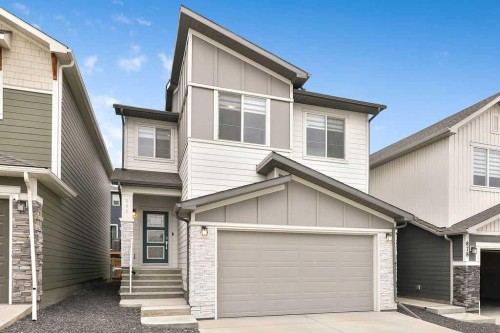 882 Bluerock Way Sw, Calgary, AB - Outdoor