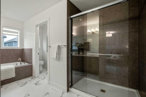 882 Bluerock Way Sw, Calgary, AB - Indoor Photo Showing Bathroom