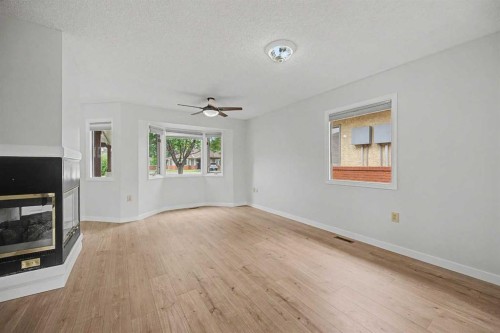 2640 Dovely Court Se, Calgary, AB - Indoor With Fireplace