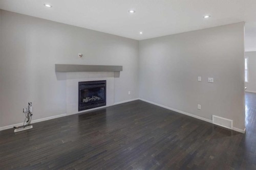 36 Copperstone Court Se, Calgary, AB - Indoor With Fireplace