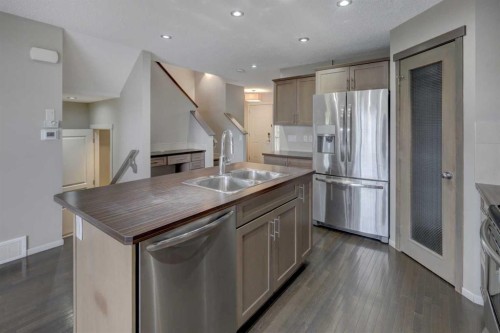 36 Copperstone Court Se, Calgary, AB - Indoor Photo Showing Kitchen With Double Sink