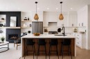 1923 26 Avenue Sw, Calgary, AB  - Indoor Photo Showing Kitchen With Fireplace With Stainless Steel Kitchen With Upgraded Kitchen 
