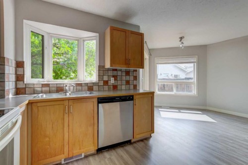 33 Everstone Avenue Sw, Calgary, AB - Indoor Photo Showing Kitchen With Double Sink