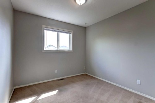 33 Everstone Avenue Sw, Calgary, AB - Indoor Photo Showing Other Room