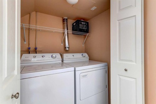 33 Everstone Avenue Sw, Calgary, AB - Indoor Photo Showing Laundry Room