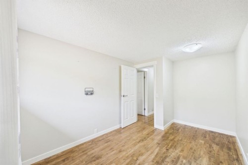 24-800 Bowcroft Place, Cochrane, AB - Indoor Photo Showing Other Room
