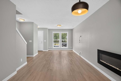 75 Auburn Bay Street Se, Calgary, AB - Indoor With Fireplace