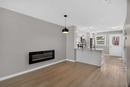 75 Auburn Bay Street Se, Calgary, AB - Indoor With Fireplace