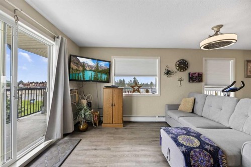 404-4514 54 Avenue, Olds, AB - Indoor Photo Showing Living Room