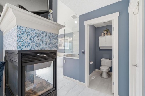 31 Chapala Close Se, Calgary, AB - Indoor With Fireplace