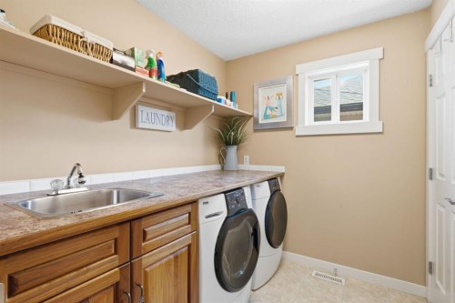 31 Chapala Close Se, Calgary, AB - Indoor Photo Showing Laundry Room