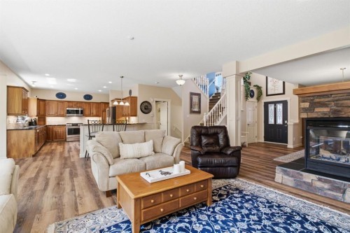 31 Chapala Close Se, Calgary, AB - Indoor Photo Showing Living Room With Fireplace