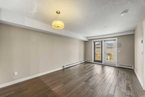 212-2300 Evanston Square Nw, Calgary, AB - Indoor Photo Showing Other Room