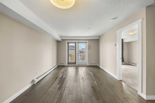 212-2300 Evanston Square Nw, Calgary, AB - Indoor Photo Showing Other Room