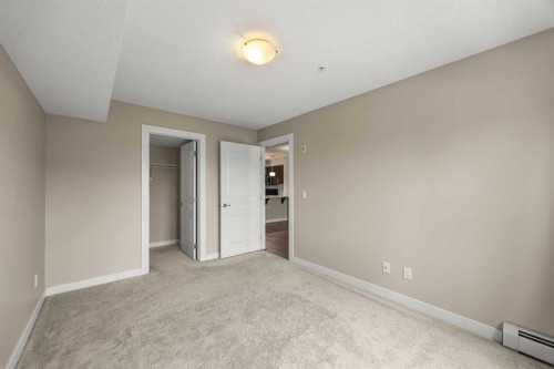212-2300 Evanston Square Nw, Calgary, AB - Indoor Photo Showing Other Room