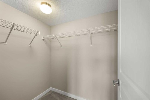 212-2300 Evanston Square Nw, Calgary, AB - Indoor With Storage