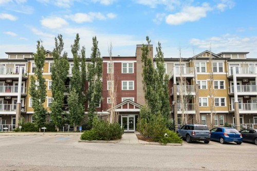 212-2300 Evanston Square Nw, Calgary, AB - Outdoor With Balcony With Facade