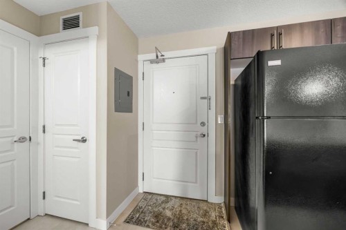 212-2300 Evanston Square Nw, Calgary, AB - Indoor Photo Showing Other Room