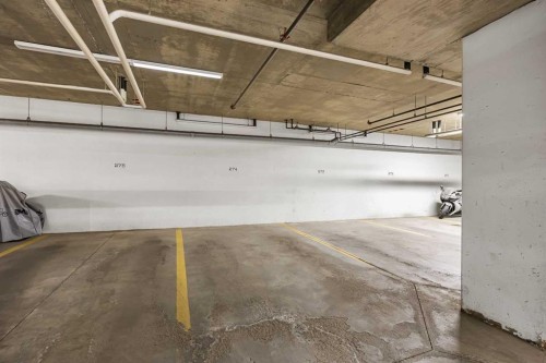 212-2300 Evanston Square Nw, Calgary, AB - Indoor Photo Showing Garage