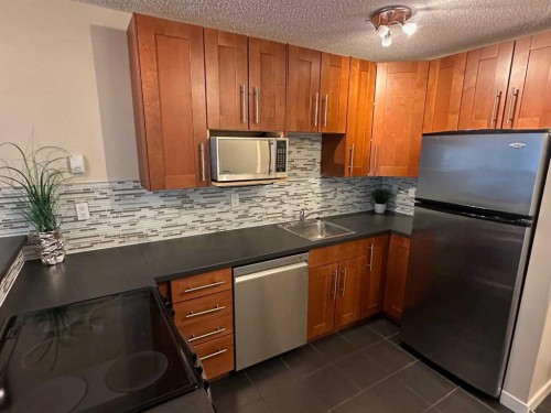 511-340 14 Avenue Sw, Calgary, AB - Indoor Photo Showing Kitchen With Stainless Steel Kitchen