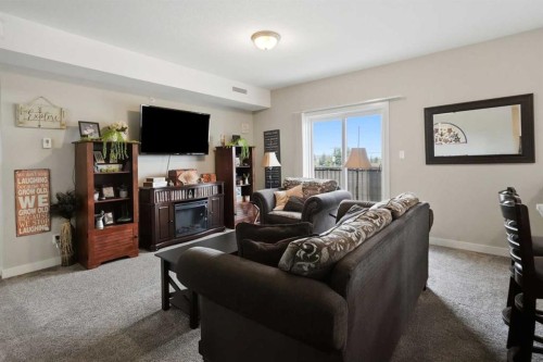 3430 49 Avenue, Red Deer, AB - Indoor Photo Showing Living Room