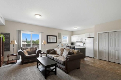 3430 49 Avenue, Red Deer, AB - Indoor Photo Showing Living Room