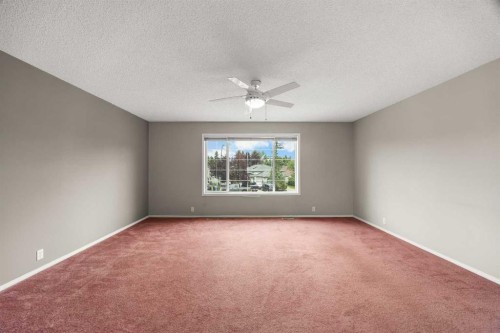 256 Harvest Glen Place Ne, Calgary, AB - Indoor Photo Showing Other Room