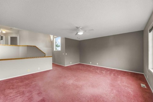 256 Harvest Glen Place Ne, Calgary, AB - Indoor Photo Showing Other Room