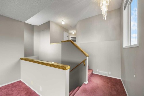 256 Harvest Glen Place Ne, Calgary, AB - Indoor Photo Showing Other Room