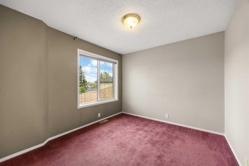 256 Harvest Glen Place Ne, Calgary, AB - Indoor Photo Showing Other Room