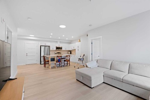 1112-81 Arbour Lake View Nw, Calgary, AB - Indoor Photo Showing Living Room
