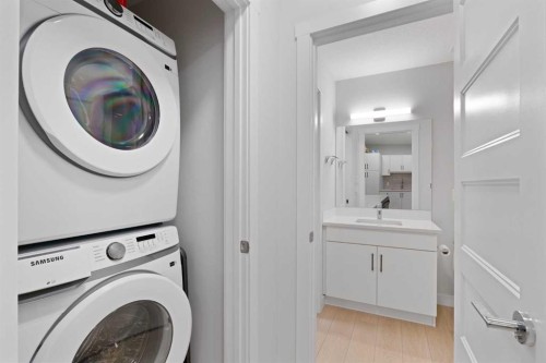 1112-81 Arbour Lake View Nw, Calgary, AB - Indoor Photo Showing Laundry Room