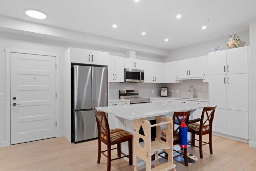 1112-81 Arbour Lake View Nw, Calgary, AB - Indoor Photo Showing Kitchen With Stainless Steel Kitchen
