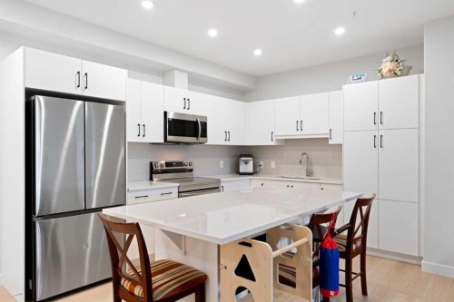 1112-81 Arbour Lake View Nw, Calgary, AB - Indoor Photo Showing Kitchen With Stainless Steel Kitchen