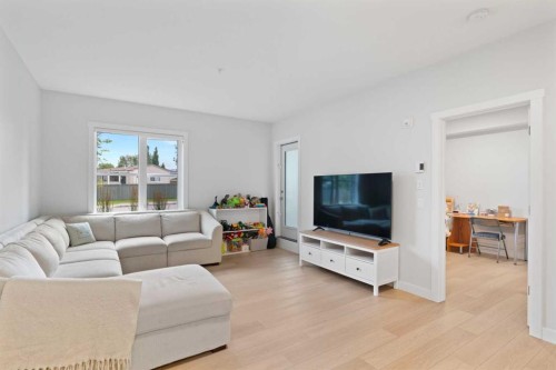1112-81 Arbour Lake View Nw, Calgary, AB - Indoor Photo Showing Living Room
