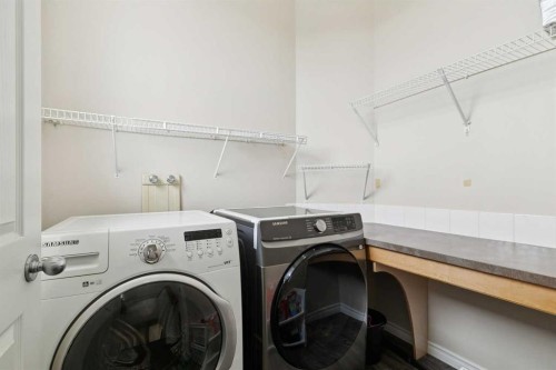 126 Somerglen Way Sw, Calgary, AB - Indoor Photo Showing Laundry Room