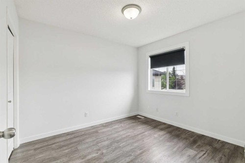 126 Somerglen Way Sw, Calgary, AB - Indoor Photo Showing Other Room