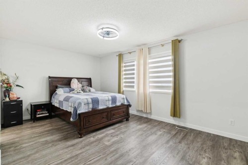 126 Somerglen Way Sw, Calgary, AB - Indoor Photo Showing Bedroom