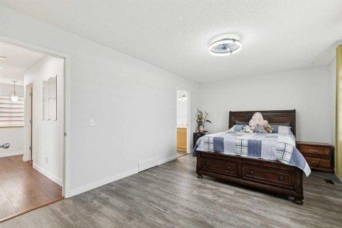 126 Somerglen Way Sw, Calgary, AB - Indoor Photo Showing Bedroom