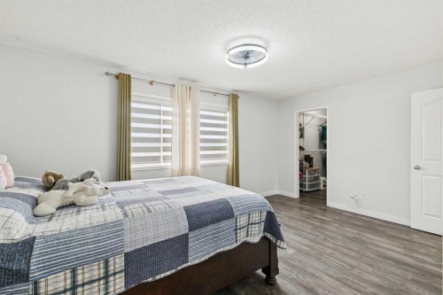126 Somerglen Way Sw, Calgary, AB - Indoor Photo Showing Bedroom
