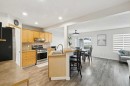 126 Somerglen Way Sw, Calgary, AB  - Indoor Photo Showing Kitchen With Double Sink 