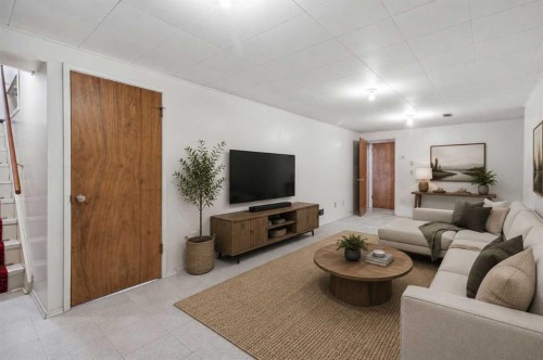 120 Glenpatrick Drive Sw, Calgary, AB - Indoor Photo Showing Living Room
