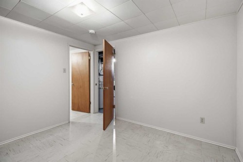 120 Glenpatrick Drive Sw, Calgary, AB - Indoor Photo Showing Other Room