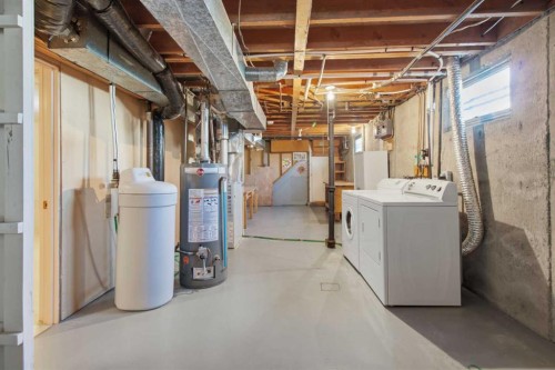 120 Glenpatrick Drive Sw, Calgary, AB - Indoor Photo Showing Laundry Room